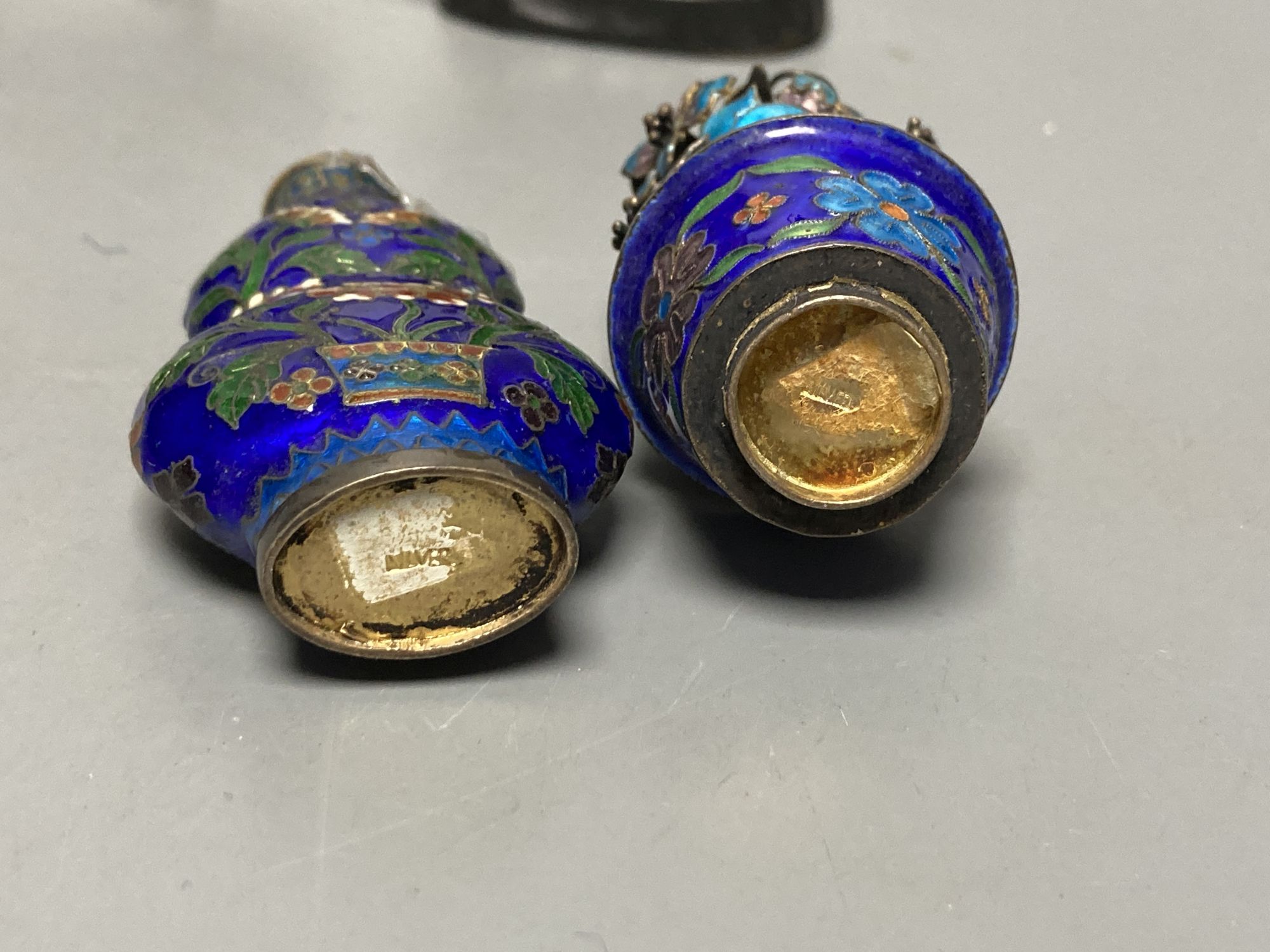 Three filigree boats, an enamelled flower pot and a snuff bottle